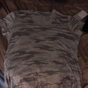 Very pretty and comfortable shirt and need to get rid of it